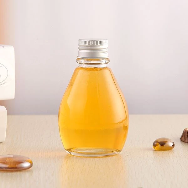 Piccola bottiglia di succo di vetro